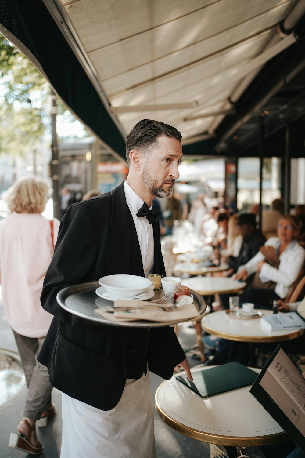 Hospitality staff providing dining service