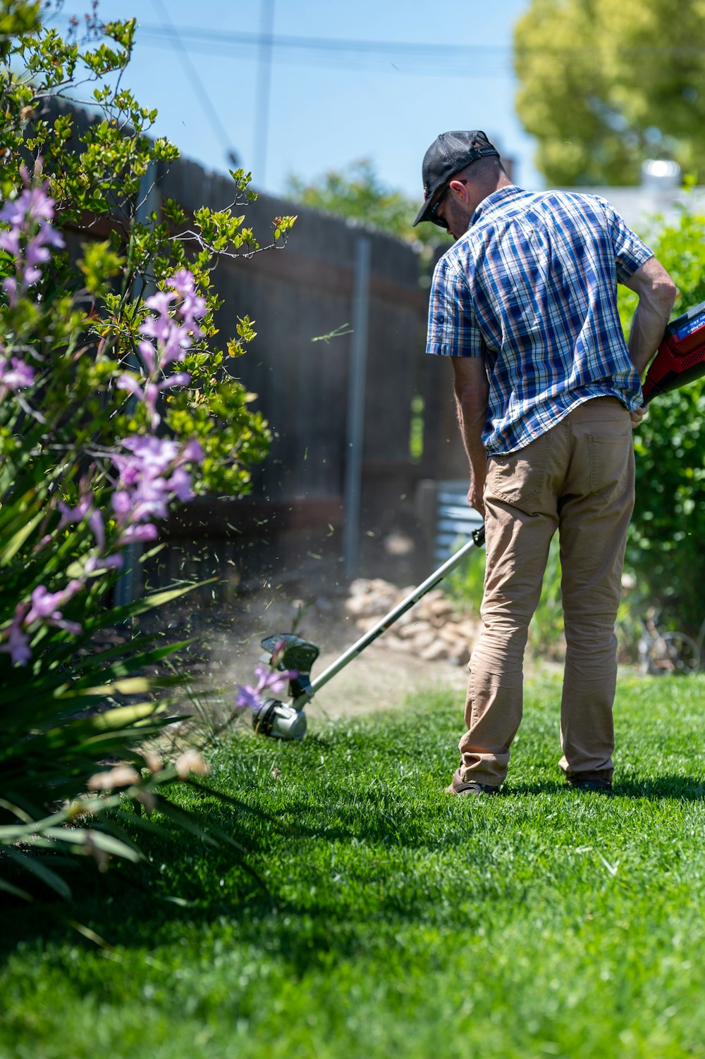 Landscaping worker maintaining green grounds